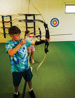 Climbing Wall family at Potters Resorts