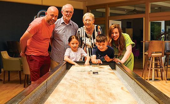 Shuffleboard family at Potters Resorts