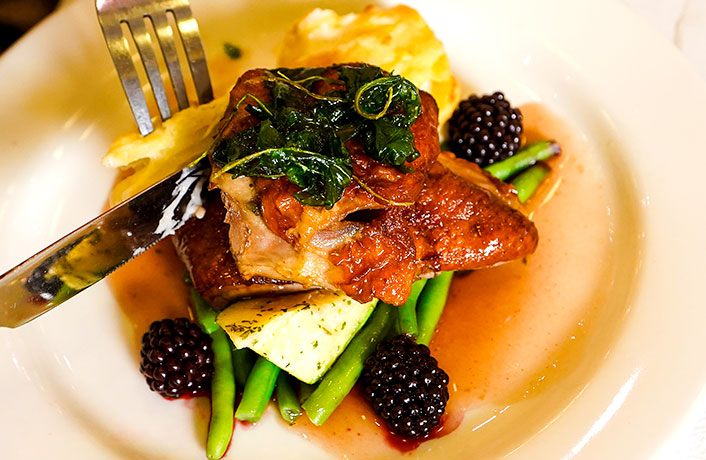 Couple laughing at dinner