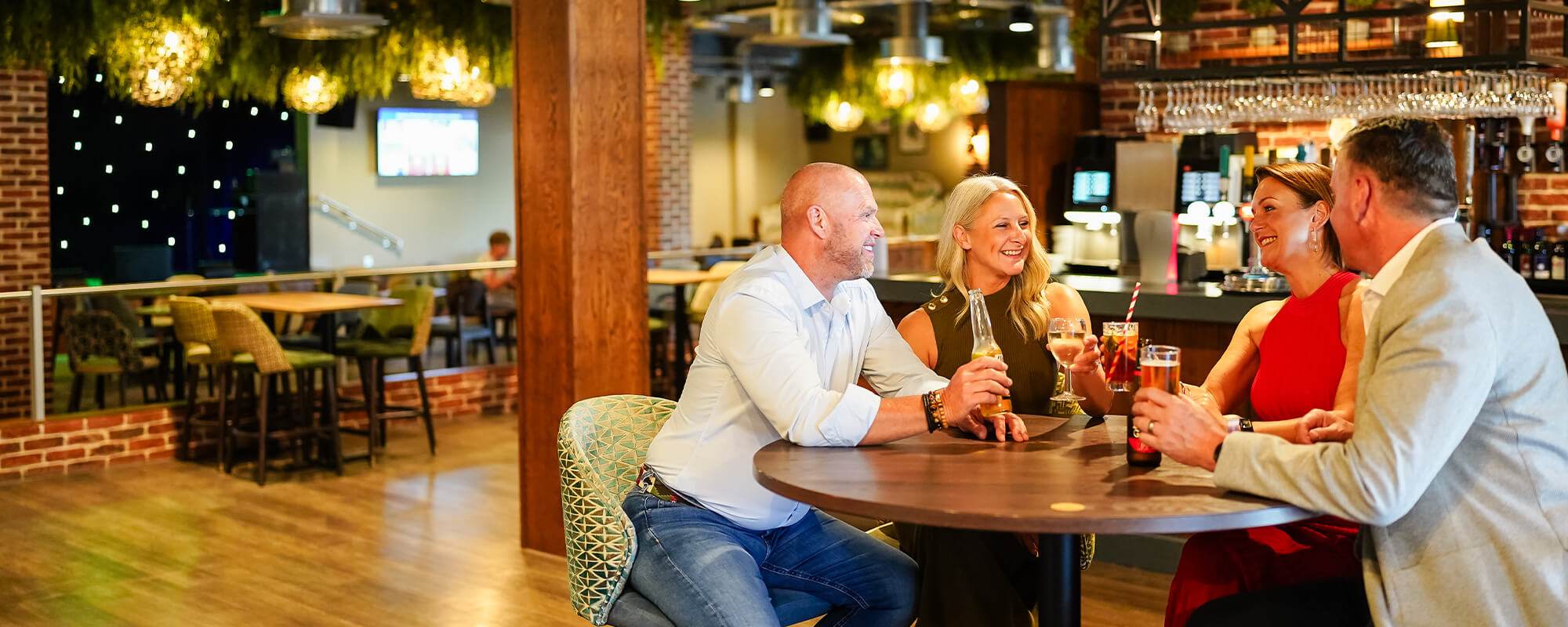 Potters Resorts couples autumn breaks enjoying drinks